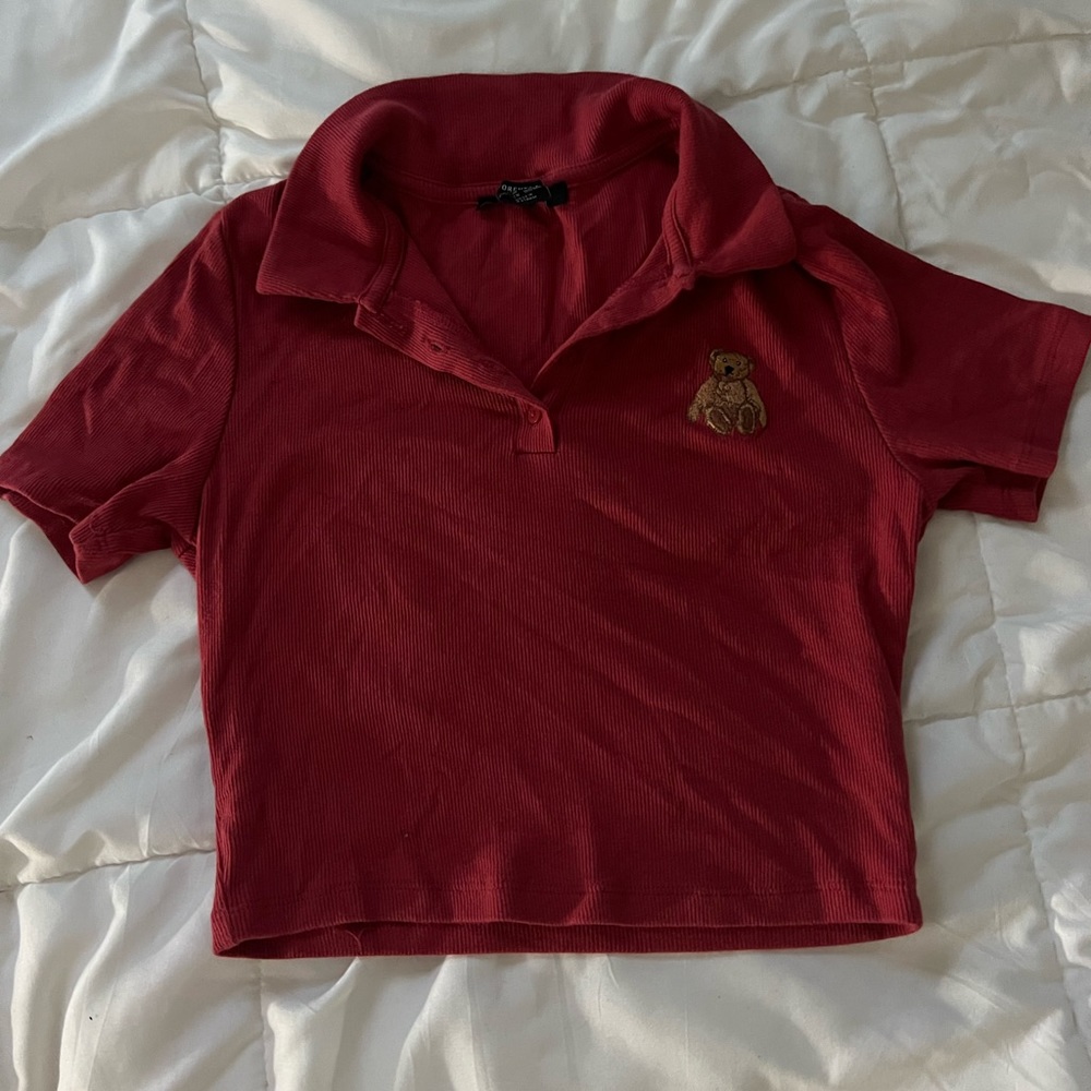 Red crop top with small bear design.